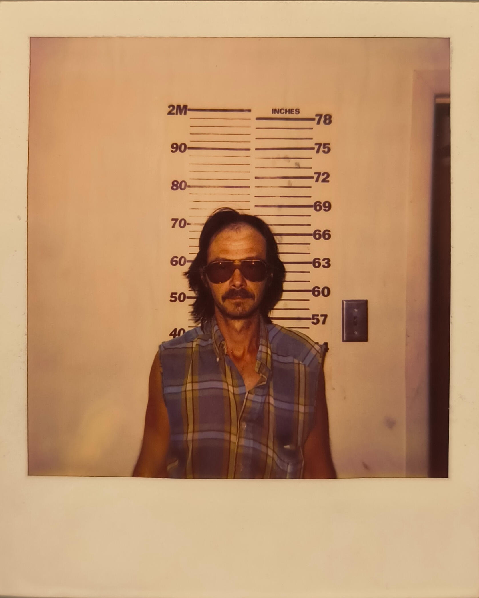 Booking photograph of Adam McCoy, Ponder County Sheriff's Dept., 12-02-1995. Fiction.